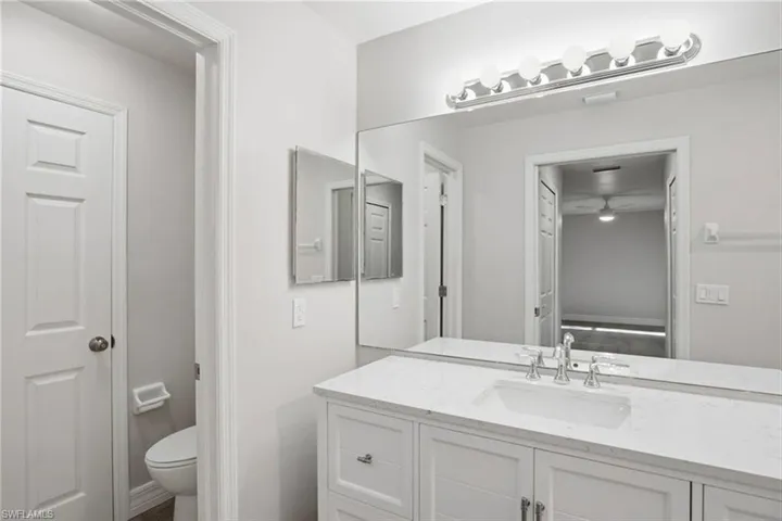 Bathroom with vanity and toilet