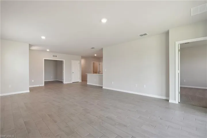 Unfurnished room featuring light wood-type flooring