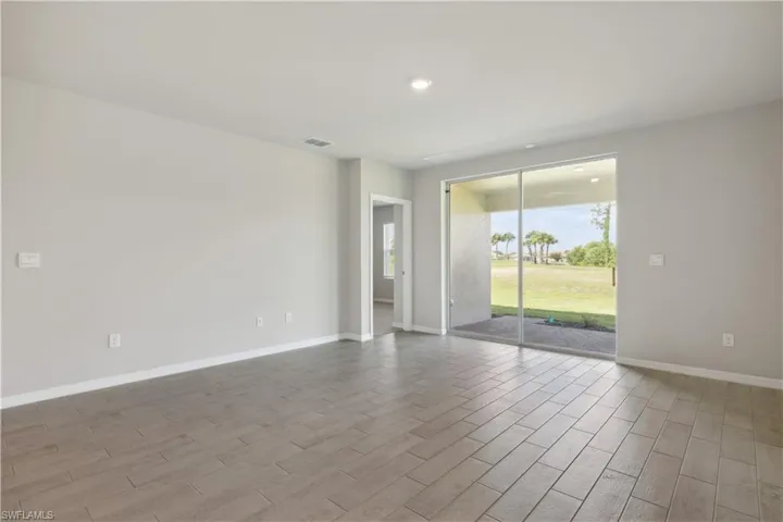 Empty room featuring hardwood / wood-style floors