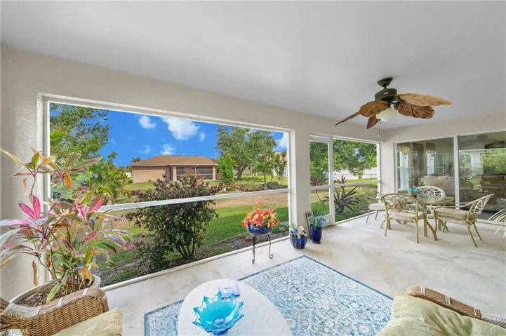 Sunroom featuring ceiling fan
