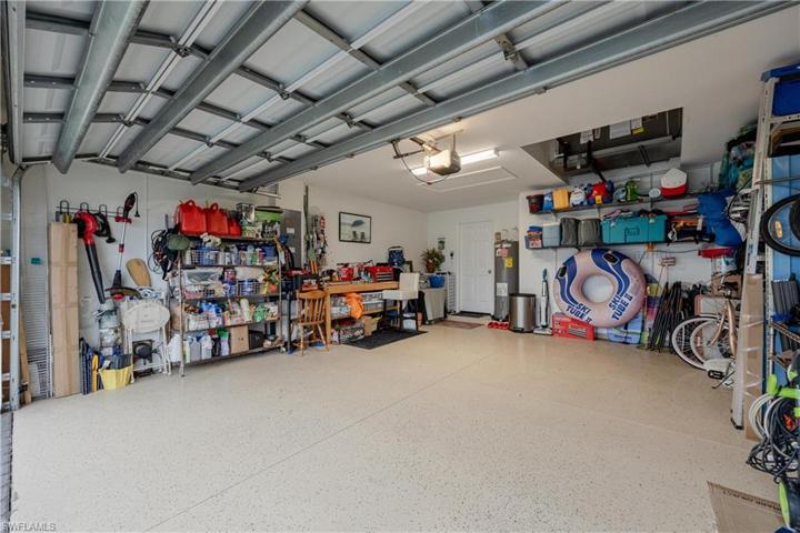 Epoxy Flooring. Attached shelving will stay.