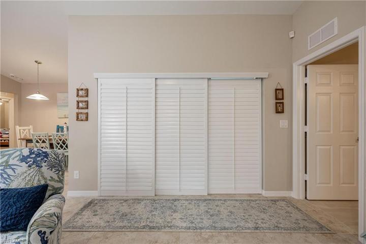 Privacy decor plantation shutters on sliding glass door