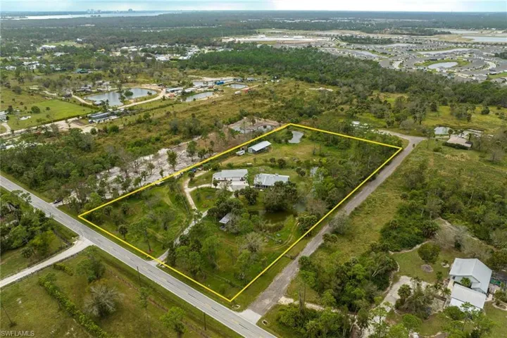 Nalle Rd is paved with and this property has city water.