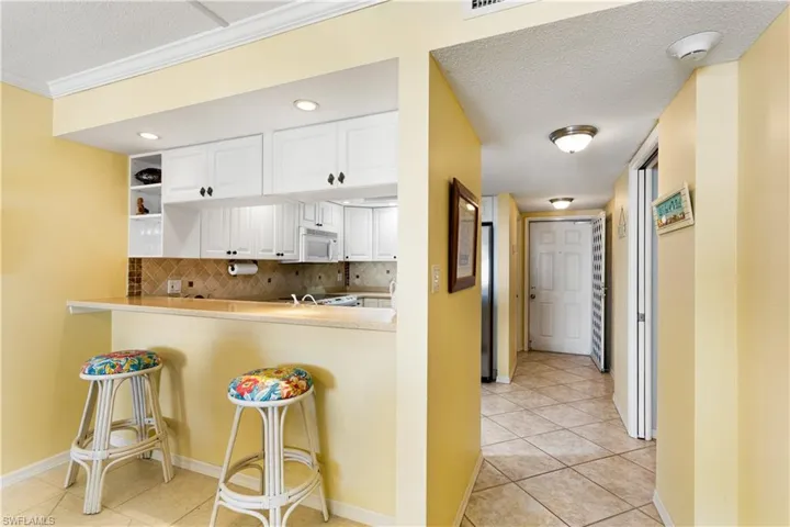 Screen Front door for great breezes, separate laundry room near entryway