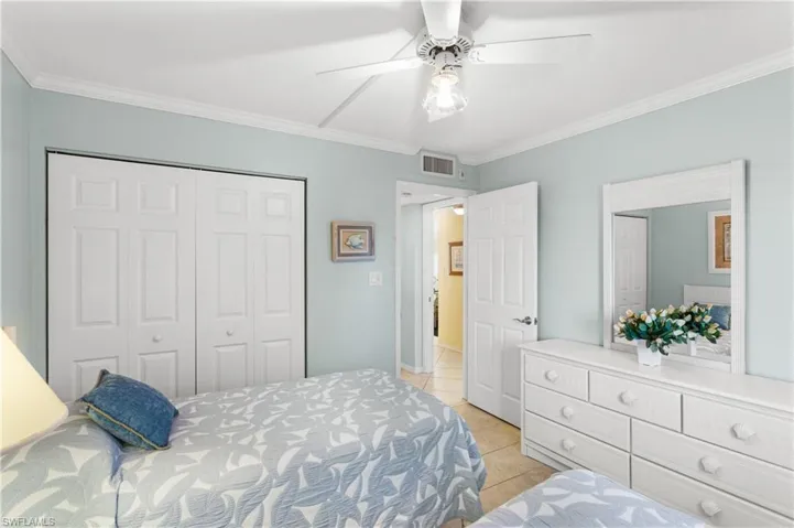 Guest bedroom is located next to the guest bathroom.