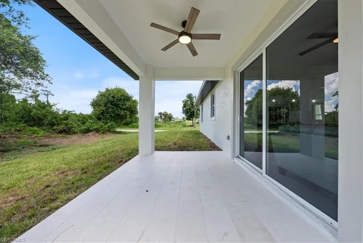 View of patio with ceiling fan