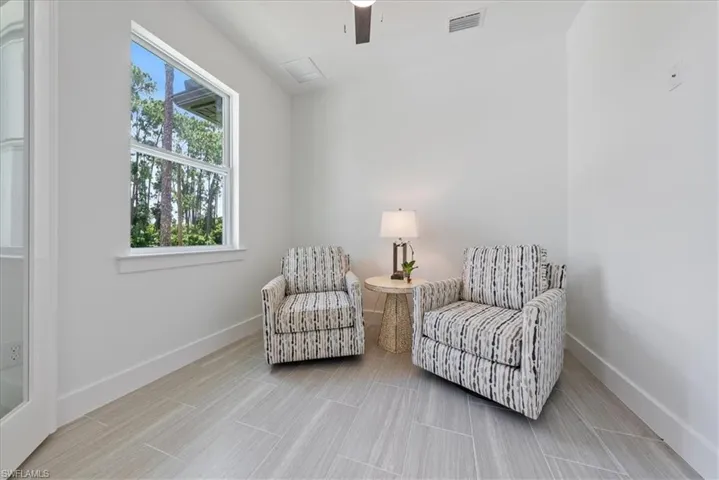 Sitting room with ceiling fan