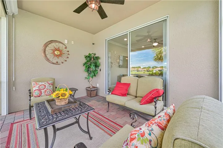View of patio featuring ceiling fan