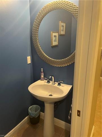 Powder room off of the family room