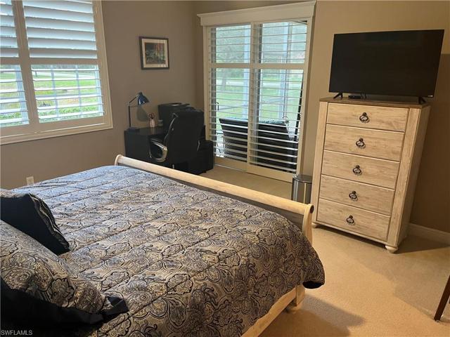 Huge master bedroom with king size bed, 2 night stands and desk