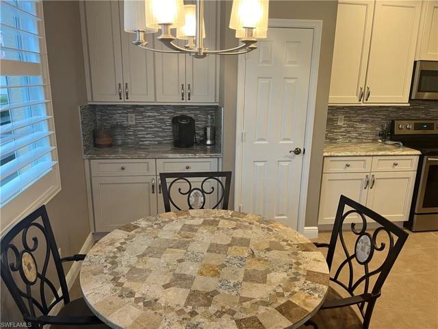 Additional Cabinets and pantry area off of kitchen