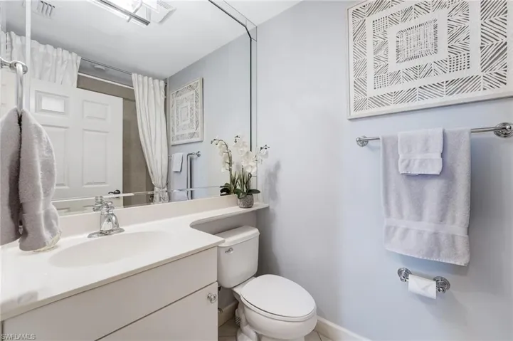 The third bedroom offers an en-suite bath featuring a shower and tub combination.