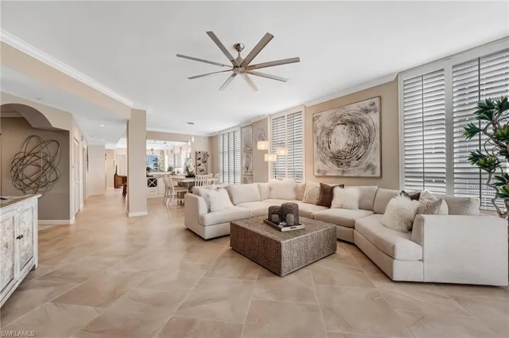 The open floor plan flows effortlessly, creating the perfect setting for both grand gatherings and intimate get-togethers.