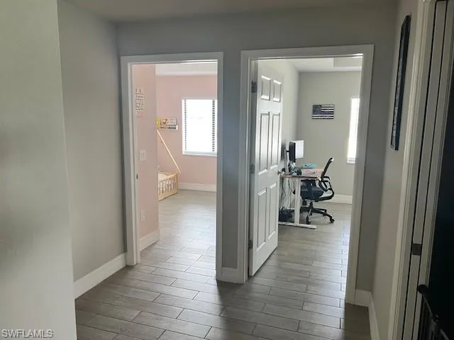 Hall featuring hardwood / wood-style floors