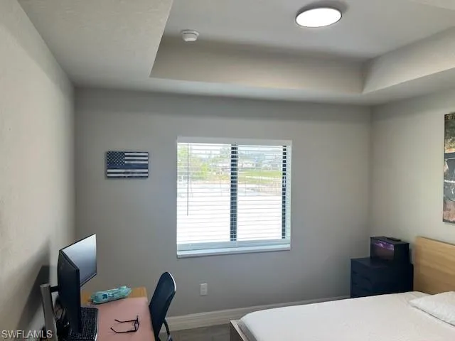 Bedroom featuring hardwood / wood-style flooring