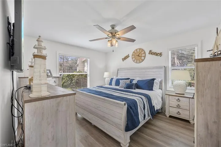 Primary bedroom with view of lake