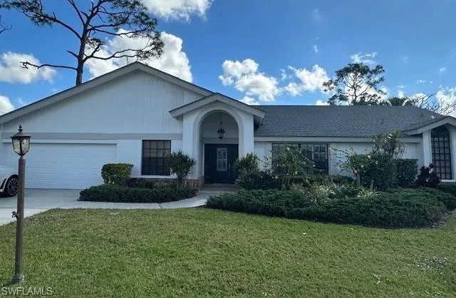 Front Elevation Showing Brand New Silver/Timberline Shingle Roof and Paint