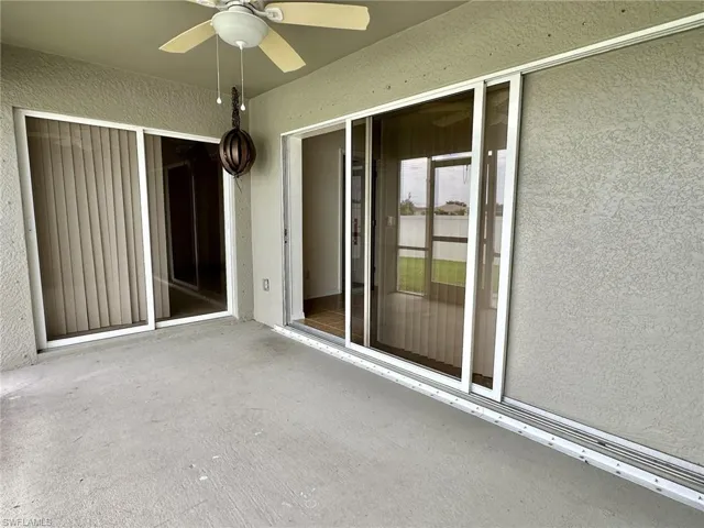 2306 view of screened lanai under truss with pocketed sliders from greatroom and primary ensuite