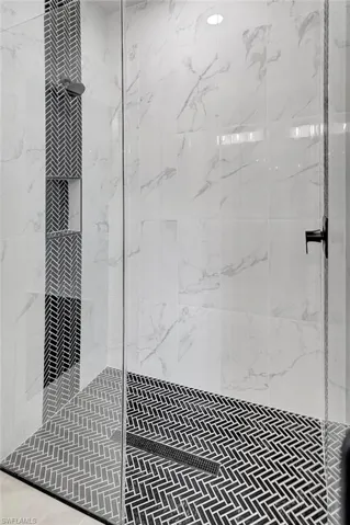 Bathroom with tiled shower