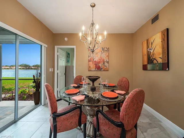 Dining area featuring a water view