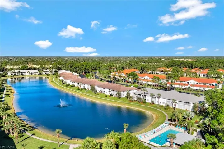 Community pool with a lake view