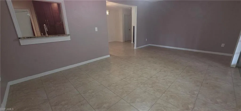 family room featuring light tile patterned floors