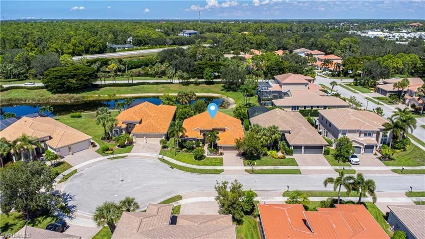 Aerial view of residential area with a large body of water