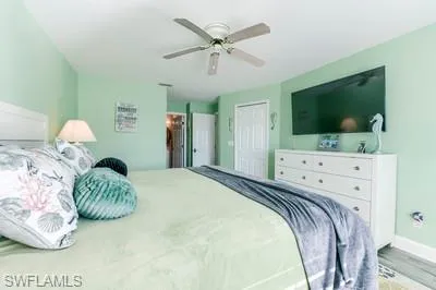 Bedroom featuring light wood-style floors and ceiling fan