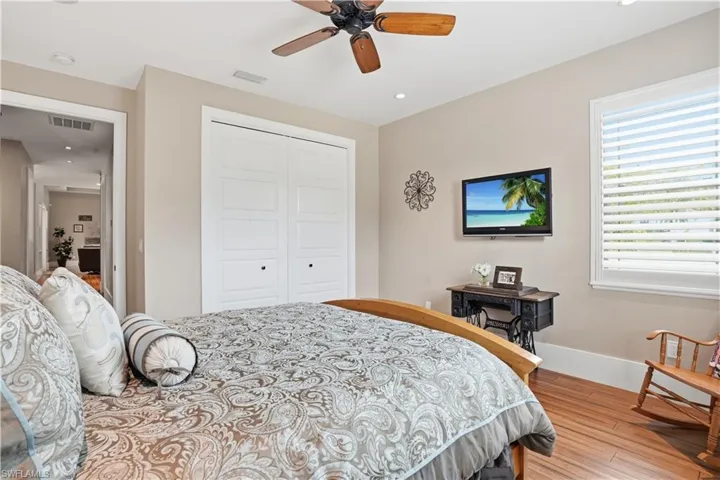 Guest bedroom is located away from the main living area.