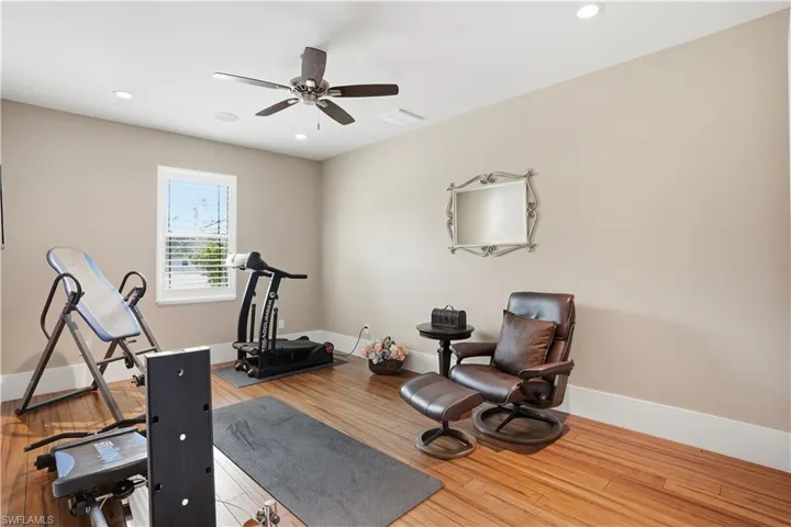 Third guest bedroom, currently being utilized as an exercise room.