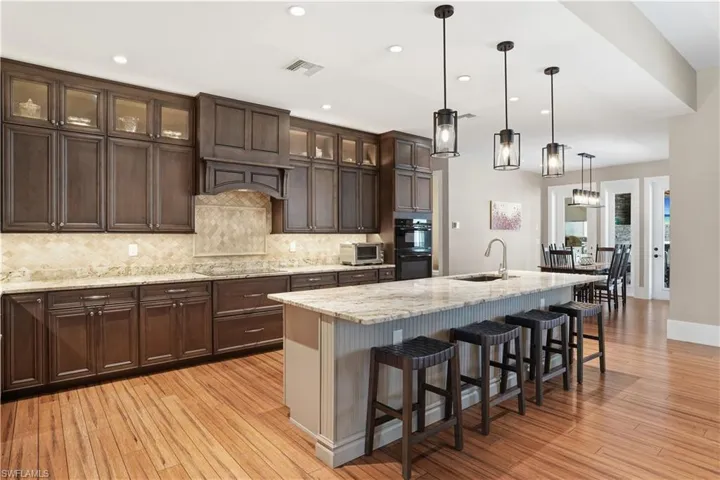 The dining area is conveniently located alongside the kitchen.