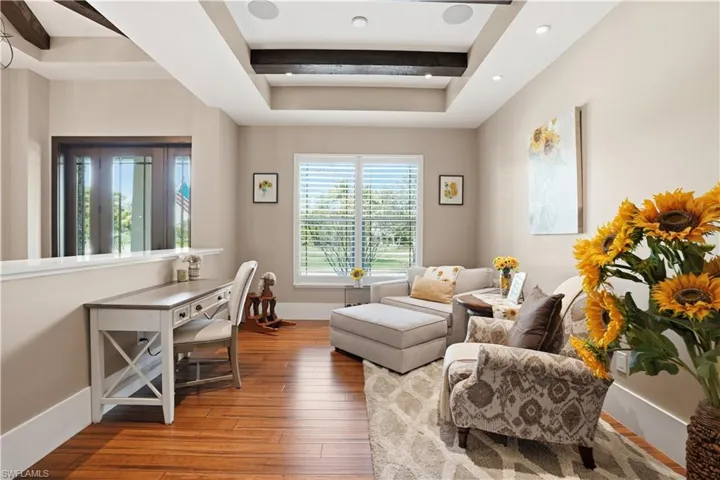 As you enter the home, notice the spacious foyer and the sitting area.