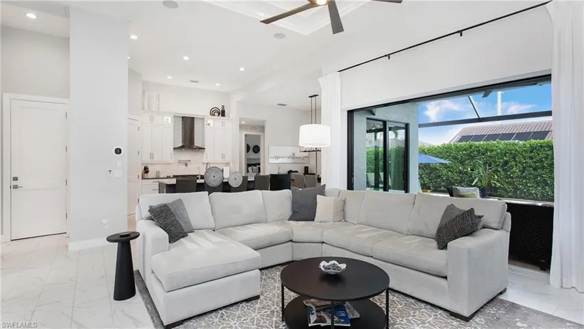 Living room featuring ceiling fan
