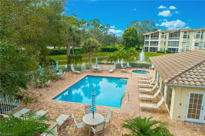 Chardonnay Community pool with a water view, a hot tub and clubhouse...