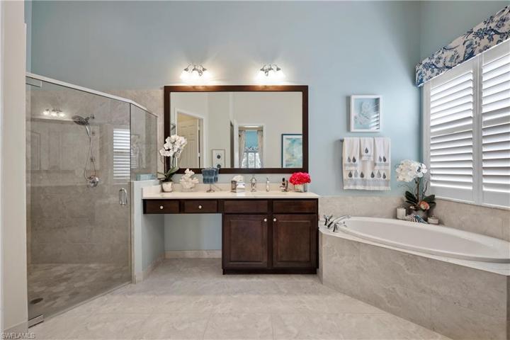 Soaking Tub with Separate Shower and Dual Vanities