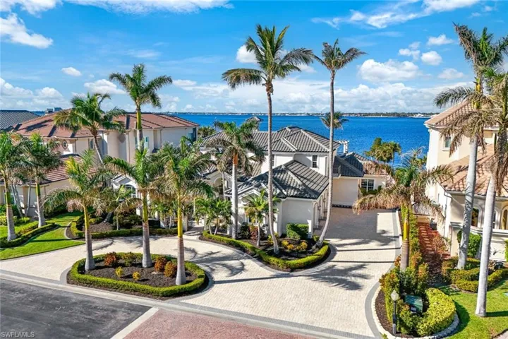 Ariel View of this stunning property with your private beach in the sought after Gulf Harbour Yacht & Country Club! Memberships are available.