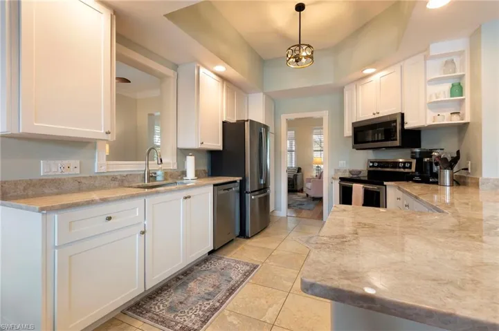 28100 Cetation Way Bonita Springs fL 34135 - Gourmet kitchen with shaker style cabinets