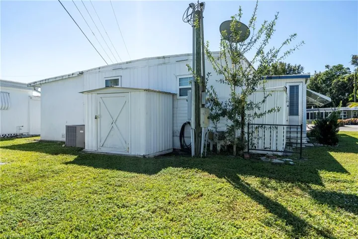 View of additional outdoor shed at back of property