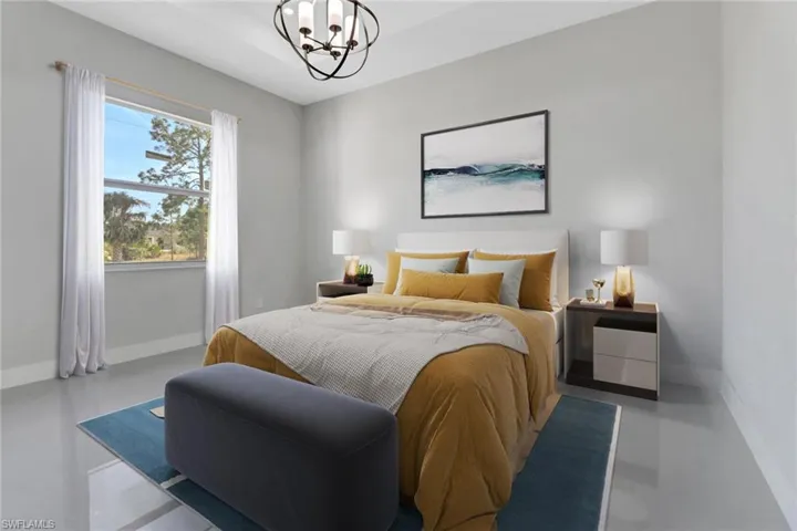 Bedroom with a notable chandelier