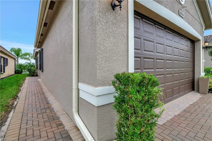 View of property exterior with stucco siding