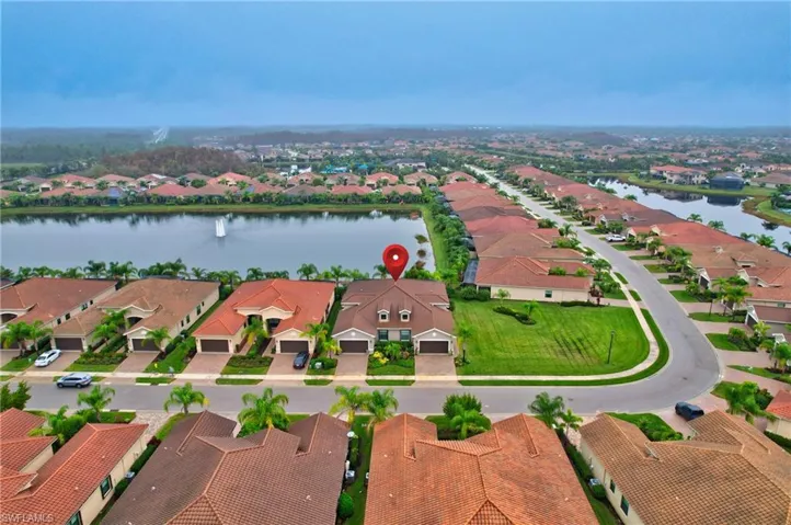 Aerial view of residential area with a nearby body of water
