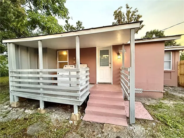 View of front facade with board and batten siding
