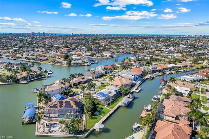 Aerial view of residential area with a nearby body of water