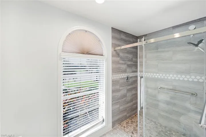 Bathroom with a stall shower