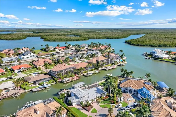Bird's eye view of a large body of water and a heavily wooded area