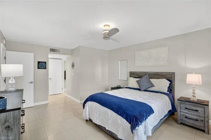 Bedroom featuring ceiling fan and light tile patterned floors