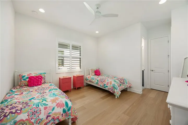 Bedroom 3 is located in the front of the home with en-suite bath and walk-in closet.