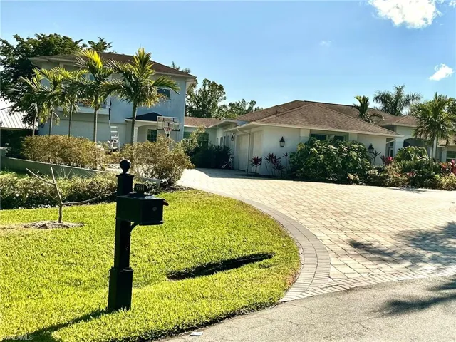 View of front of property featuring five-car garage