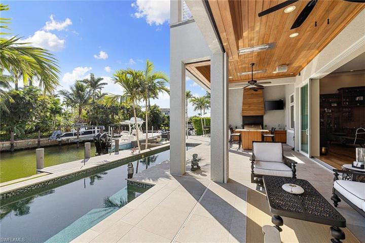 Saltwater pool with extended lap lane