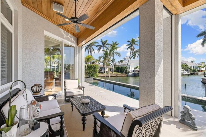 Exterior waterfront entertaining. Can be fully enclosed with remote screens.
